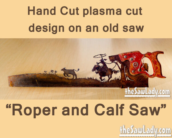 Metal art cowboy roping calf saw