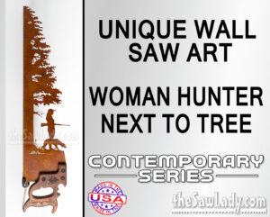 Woman-hunter-next-to-tree_VERT metal wall art saw